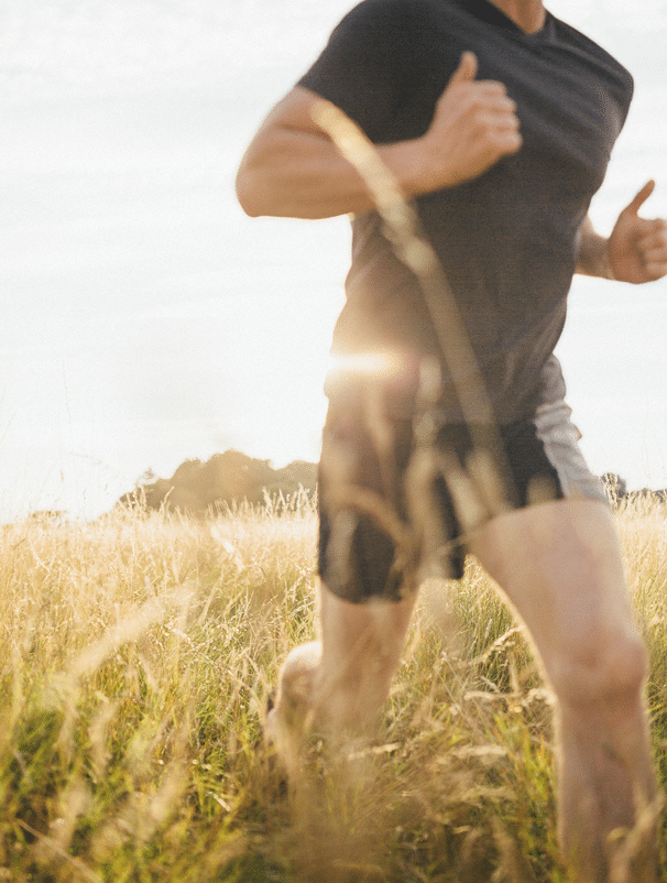 Man Running in the park in the Early Morning